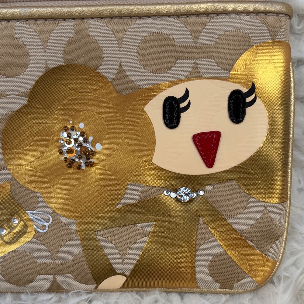 Coach Goldy Signature Canvas Pouch Wristlet with Playful Character